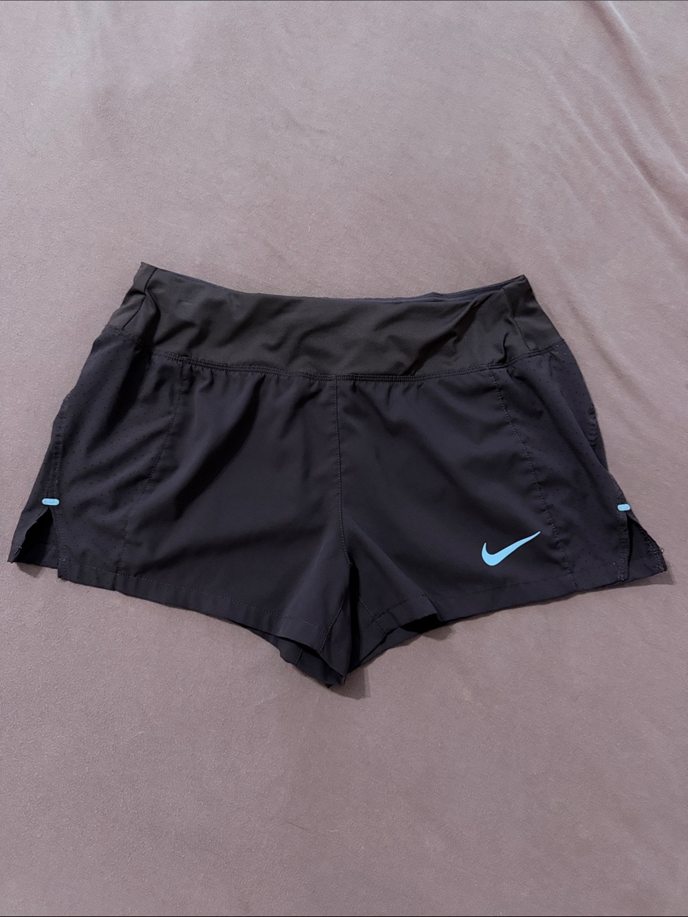 Nike Women's Black Athletic Shorts with Light Blue Swoosh